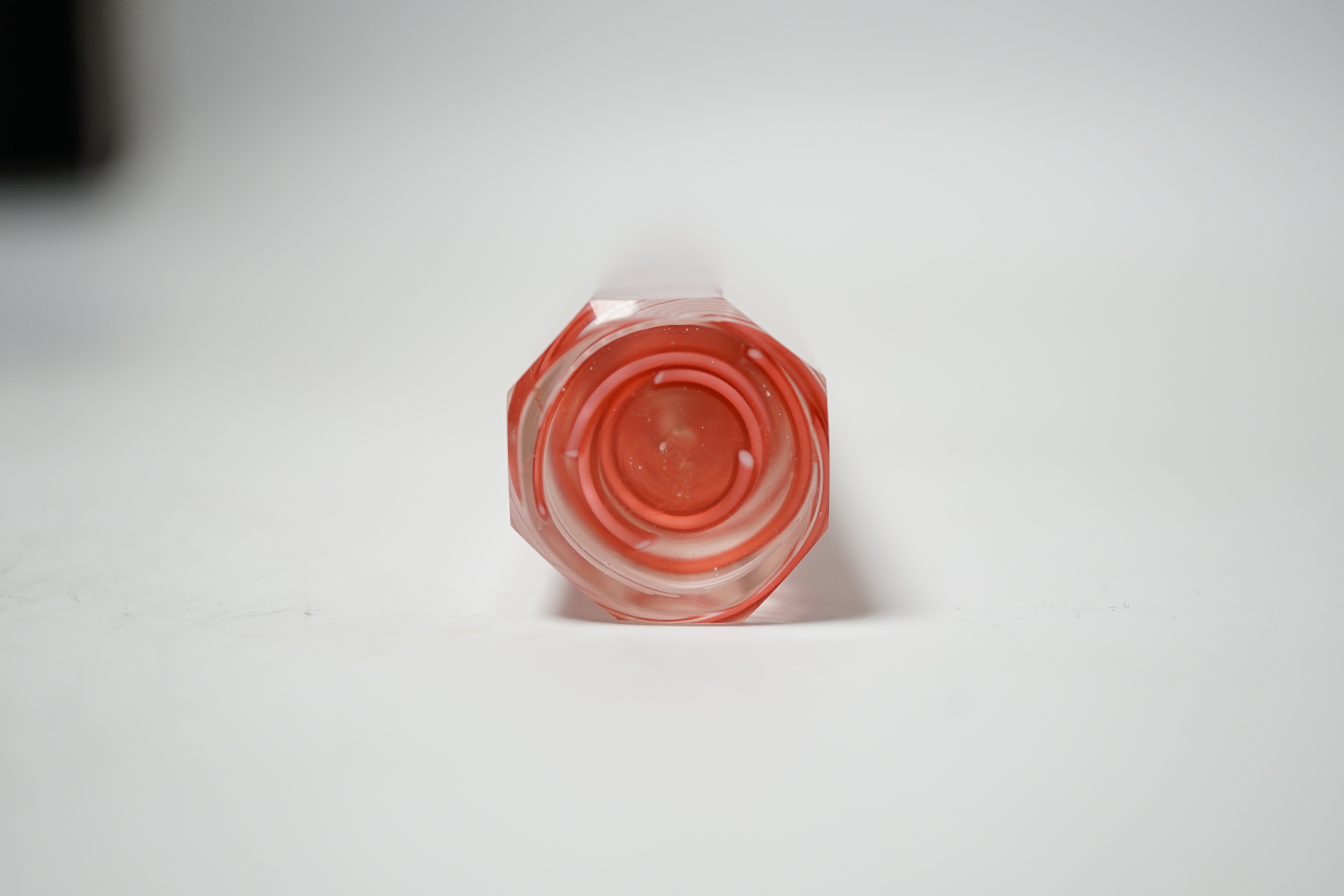 An octagonal glass colour twist rule, 24.5cm